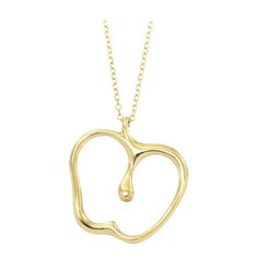 TIFFANY & Co. Elsa Peretti 18K Gold Apple Pendant Necklace Metal: 18K yellow gold Weight: 3.60 grams Chain: 16" Pendant: 16.10mm wide x 17.20mm high Hallmark: "T&CO. 750 PERETTI" on chain tag, "750" on chain clasp Limited edition, no longer available for sale in Tiffany stores Authenticity Guaranteed