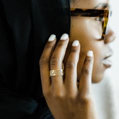 Inspired by the naturally occurring illusion of a mirage in the desert, this Arizona-inspired ring features staggered cut-through lines on a thick band to emulate the fluttering image of the surrounding area of the desert. This piece delivers a timeless and unique design meant for everyday wear. The word 'mirage' is a French-created word that translates to "to look at or to wonder at". Materials & Warranty 18K Gold Plating on pure stainless steel Hypoallergenic | Sensitive-skin friendly Waterpro Minimalist Wide Band Stackable Jewelry, Modern Stackable Wide Band Jewelry, Modern Wide Band Stackable Promise Rings, Modern Stackable Midi Rings For Promise, Modern Adjustable Stackable Promise Rings, Modern Wide Band Promise Ring, Modern Adjustable Stackable Wide Band Ring, Modern Adjustable Midi Rings For Promise, Polished Stackable Rings For Promise