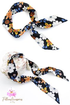 Multicolored, colorful scarf with beautiful pattern variegated with flowers in orange, white, navy, yellow, pale pink on black background. Vibrant colors, smooth high quality trendy silk viscose satin fabric. Scarf Head