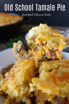 an old school tamale pie on a plate with a fork