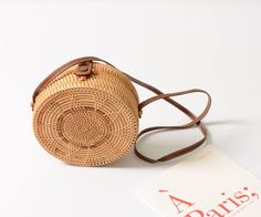 wickedafstore Koh Samui Crossbody Bag Bohemian Light Brown Bag For Vacation, Bohemian Light Brown Shoulder Bag For The Beach, Brown Crossbody Straw Bag With Bamboo Handle, Light Brown Straw Beach Bag With Adjustable Strap, Light Brown Straw Bag With Adjustable Strap For Beach, Beige Rattan Shoulder Bag With Adjustable Strap, Beige Crossbody Straw Bag With Bamboo Handle, Bohemian Spring Straw Crossbody Bag, Bohemian Crossbody Straw Bag For Spring