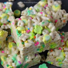 lucky charms rice krispy treats are stacked on top of each other with sprinkles