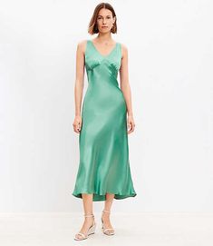 In fluid woven satin and cut on a flattering bias, this double-V dress does love-forever Hollywood glam with modern-minimalist flair. V-neck and back. Sleeveless. Back zip. Lined.,Hit:Hit: Midi - Hits at mid-calf,Imported:Imported,Fit:Fit: Swing - fits loose and swingy,Length:37 1/2" from top back neck to hem, measured from a size 8/M,Fabrication:Shell: 100% Viscose, Lining: 100% Polyester,Garment Care:Machine Washable Loft Satin Double V Bias Midi Dress Size 8 Deep Grass Green Women's by Loft S Extra Dresses, Bias Dress, V Dress, Bias Cut Dress, Midi Slip Dress, Sleeveless Dress Summer, Hollywood Glam, Dress Satin, Satin Midi Dress