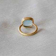 D E T A I L S - Material: 925 Sterling silver Stone: Aqua Chalcedony Ring The fit: True to US ring size Finish: Textured and Gold Plated to a high shine S H I P P I N G & P R O D U C T I O N - My current production time is 2-6 business days, which means after those days are up, your order ships! I make everything custom to order, by hand, but I promise you it's worth the wait! R U S H - M Y - O R D E R - If you're in a rush to get your pretty new pieces, please send me a message and I'll let Aqua Chalcedony Ring, March Birthstone Ring, Chalcedony Ring, Aqua Chalcedony, Textured Ring, March Birthstone, Onyx Ring, Plated Ring, Gold Plated Rings