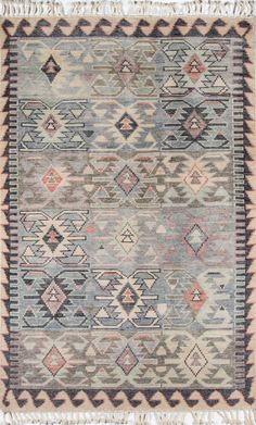 an old rug with many different colors and patterns