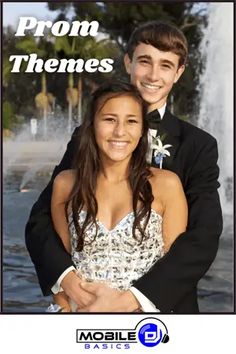 a young man and woman hugging each other in front of a fountain with the words prom themes 2012 on it