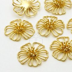 gold plated metal flower charms, set of 6 - product image is not available