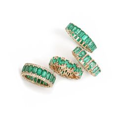 Our emerald eternity bands in 14K & 18K yellow, rose, and white gold are set with shimmering emeralds and white diamonds. The eternity of emeralds and diamonds spans the entire band. Wear these alone or stacked with multi-colors and/or other rings from our collection. We have varying sizes in stock, you can order to your specific size of diamonds and color of diamonds and gold--most of our special order eternity bands can be completed with in a few days to one week. 14K Gold or 18K gold Emeralds and White Diamonds 4 cts Emeralds, .20 ct diamonds 20 emeralds and 76 diamonds (depending upon size of diamonds and ring size) 5 x 3 emeralds 3.5 grams gold Available in rose, yellow, or white gold Made in Los Angeles Complimentary gift wrapping Emerald Eternity Band, Bezel Set Earrings, Signature Bracelet, Diamond Stacks, Bridal Diamond Jewellery, Diamond Eternity Band, Diamond Education, Bridal Bands, Diamond Charm