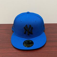 Brand - New Era Hat Model - 59fifty Hat Type - Fitted Team - New York Yankees 1999 World Series Color - Blue & Black Condition- Brand New Sizes Available; 7 1/2, 7 3/8, 7 5/8, 7 7/8 Blue Flat Cap For Baseball Season, Blue Fitted Hat For Baseball Season Streetwear, Blue Flat Cap For Streetwear, Blue Flat Cap Fitted Hat For Streetwear, Blue Flat Crown Hat For Streetwear, Blue Fitted Hat With Flat Brim For Streetwear, Blue Fitted Cap For Streetwear, Blue Flat Brim Fitted Hat For Streetwear, Blue Flat Cap For Sports