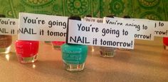 four nail polish bottles are lined up with small signs on them that say you're going to nail it tomorrow