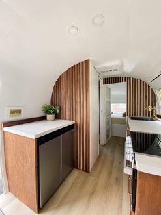 the kitchen is clean and ready to be used as a living room or dining area