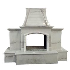 a white marble fireplace with a black door on the top and bottom part, in front of a white background