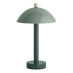 a green table lamp on a white background