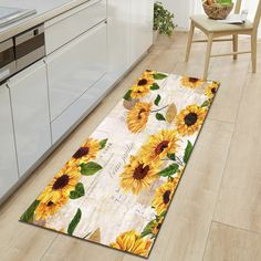 a kitchen area rug with sunflowers on it