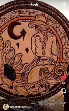 an intricately decorated wooden plate is shown in this video screen grab from the app