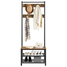 a coat rack with shoes, hats and scarves hanging from it's sides