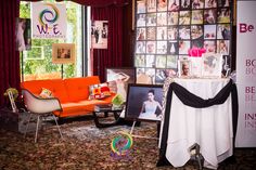 a living room filled with furniture and pictures