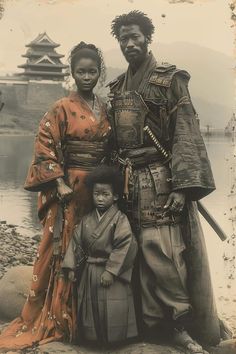 an old photo of two people standing next to each other in front of a body of water