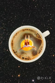 a woman floating in a cup of coffee