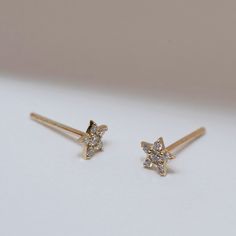 Alcyone is the brightest in the constellation of the seven sisters.  This darkly shimmering earring is inspired by her beauty.  Sold as a SINGLE individual stud. For a pair please add 2 to your cart.   Stone: 6 White Diamonds. Total Diamond Weight 0. 065ct, H Colour, SI1 Clarity. The good news is investing in solid gold or platinum jewellery means that it is far less prone to wear and tear.  You can use a mild jewellery cleaner and a polishing cloth to bring out the shine in your solid gold. Reg Celestial Diamond Earrings As Gift, Sparkling 14k Gold Earrings For Gift, The Seven Sisters, Seven Sisters, July Birthstone Jewelry, Platinum Jewelry, Pearl Jewellery Earrings, Diamond Stud, Cuff Earrings