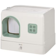 a white and green cat litter box with the door open to show it's inside