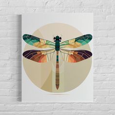 a poster with a dragonfly on it's back, against a white brick wall