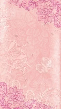 an ornate pink background with flowers and swirls