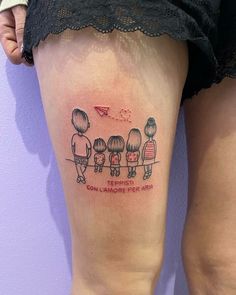 a woman's thigh with an image of three people on it and the words, love