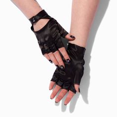 Fingerless gloves add an edgy vibe to any outfit, dressy or casual! These feature a shiny satin-like texture and a snap closure. Pack Size: 1 Pair One size Closure: Snap Material: Polyester - Claire's Black Satin Fingerless Gloves Leather Fingerless Gloves Aesthetic, Emo Fingerless Gloves, Y2k Fingerless Gloves, Black Fingerless Gloves Aesthetic, Cyberpunk Gloves, Black Gloves Aesthetic