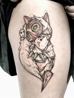 a woman's thigh with a cat tattoo on it