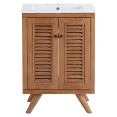 a wooden cabinet with shutters and a white sink