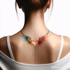 the back of a woman's neck with colorful wings on her upper and lower part