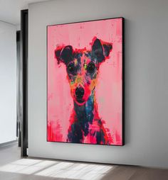 an abstract painting of a dog in pink and blue on a white wall next to a wooden floor