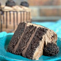 a piece of chocolate cake on a blue plate