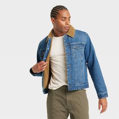 This Faux-Shearling Lined Denim Trucker Jacket from Goodfellow & Co™ is perfect for cold weather. Tailored in a casual fit, this denim trucker jacket in blue sports a classic collared neckline with front buttons, French cuffs and buttoned flap pockets and side pockets for functional style. The heavyweight fabric with faux-shearling lining offers cozy comfort, and you can layer it over a range of outfits buttoned up or down to create a variety of looks. Goodfellow & Co™: Feel good in what you wea Shearling Outfit, 90s Baggy, Functional Style, Iron Heart, Denim Trucker Jacket, Boys Denim, Men's Jackets, Recycled Polyester Fabric, Mens Plaid