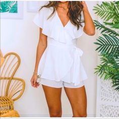 Fun White Romper That Ties And Wraps Into A Bow At The Waist! Perfect For Brides, Game Days, Graduation, Or A Party! Never Worn Pink Lily Boutique, Wrap Romper, Lily White, Pink Jumpsuit, White Romper, Pink Lily, Pant Jumpsuit, Jumpsuit Romper, Pink Ladies