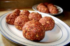 some meatballs are sitting on a plate