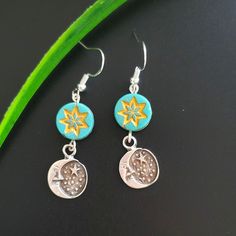 Beautiful Crescent Moon Celestial Earrings Dangle. Made With High Quality Antique Silver Charm, Turquoise Star Bead And Sterling Silver Hook Earrings. These Artisan-Made Earrings Perfectly Hang 1.5 Inches. Lightweight And Super Comfortable To Everyday Wear. All Jewelry Components Are Lead And Nickel Free! Blue Dangle Earrings With Moon Charm, Blue Moon Shaped Earrings With Moon Charm, Blue Moon-shaped Earrings With Moon Charm, Blue Round Earrings With Moon Charm, Blue Moon-shaped Metal Jewelry, Elegant Blue Earrings With Moon Charm, Blue Moon Charm Earrings, Celestial Nickel-free Earrings As Gift, Nickel-free Celestial Earrings Gift