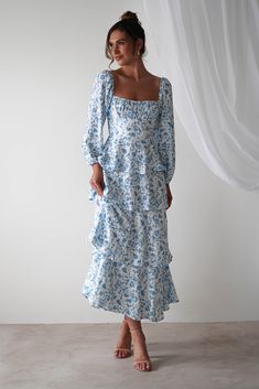 Highlights Gorgeous summer print maxi dress Stunning ruffle detail Beautiful off-the-shoulder balloon sleeves Sizing The model is 5'10 and wears UK size 8 / S / US size 4 Fit & Fabric Made from 90% Polyester & 10% Spandex Rear zipper True to size Length from top of shoulder to hem: 133cm Sleeve Length: 64cm Stretch: 6/10 Perfect for Wedding Guests Summer Events Black Tie Bridesmaids, Blue Green Dress, White Bridal Dresses, Maxi Dress Wedding Guest, White Bridesmaid Dresses, Formal Dress Shops, Black Tie Dress, Rehearsal Dress, Maxi Gown Dress