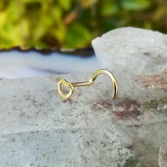 "Nose ring stud, 14K solid yellow gold heart. Available in 20 or 18 gauge. Available as a nose ring or cartilage earring. Nose ring - \"L\" post, screw back right or screw back left post. Cartilage earring - 11mm post with GF butterfly and silicone backings. Heart size: 3.6mm X 4mm The perfect gift for you or your loved ones. Follow us on: Instagram @sampsonjewelry Facebook @sampsonjewelry Pinterest @sampsonjewelry Tweet on Twitter @sampsonjewelry To save for later, click Add Item to Favorite. W Dainty Pierced Rings For Gifts, Dainty Pierced Rings As Gifts, Yellow Gold Internally Threaded Rings For Gift, Gold Internally Threaded Ring As Gift, Ring Gold Design, Nose Ring Designs, Heart Nose Rings, Nose Ring Gold, Ear Lobe Piercings