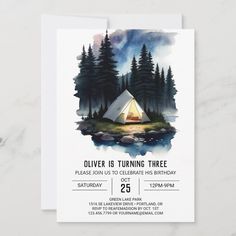 a camping birthday party with a tent and trees