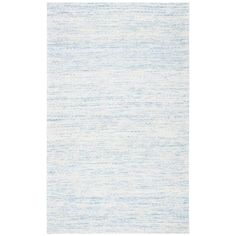 a white and blue rug on a white background