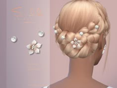 the back of a woman's head with flowers and pearls in her hair,