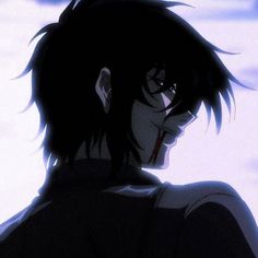 a man with black hair and glasses staring at something