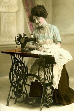 an old fashion photo of a woman sewing