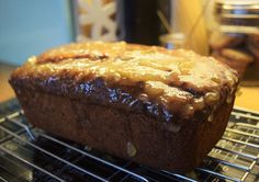 a loaf of bread sitting on top of a cooling rack