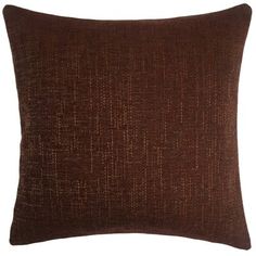 a brown pillow on a white background