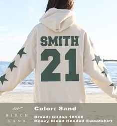 Show your love for your favorite school, team or person with this adorable custom number sweatshirt!! This cozy sweatshirt features your custom number (and optional name) with 3 cute stars on each sleeve, printed on a comfortable fit, crewneck sweatshirt that fits like a well-loved favorite. -->> Want this design on the back of a hoodie sweatshirt?? Snag it here: https://onbirchlane.etsy.com/listing/1725001260 We have tons of cute designs in our shop, check them out here! https://onbirchlane.ets Cheap Sweatshirt With Team Name For Fans, Sports Numbers, School Team, Cute Stars, Sports Mom, Branded Sweatshirts, Workout Sweatshirt, Sports Gifts, Cozy Sweatshirts