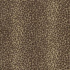 a brown and white animal print fabric