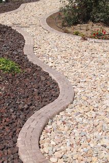 a pathway made out of rocks and gravel